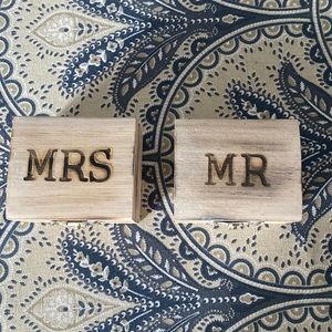 His and hers wood ring boxes.